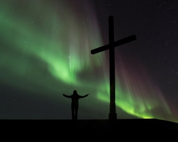 cross in the northern lights