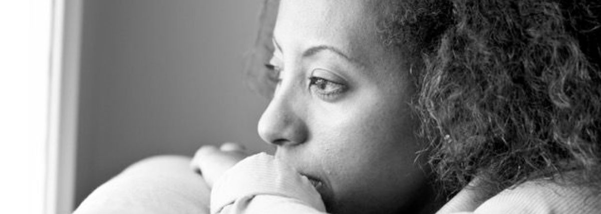 Woman staring out the window